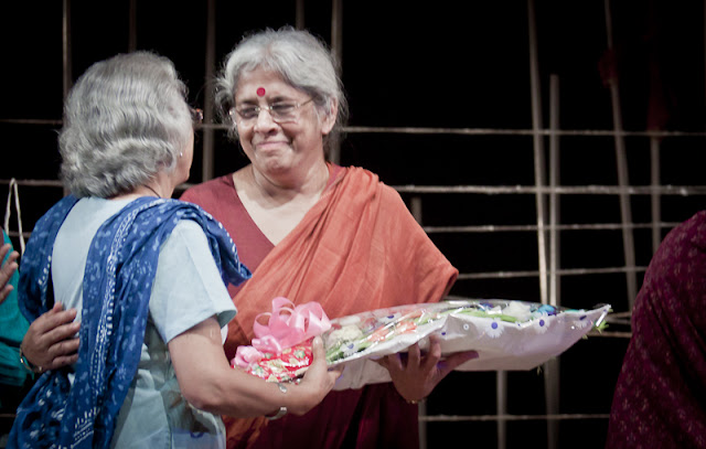 The director Ms. Kirti Jain being presented a bouquet after the completion of the play. The play was very complicated with each scene involving interactions between multiple characters.