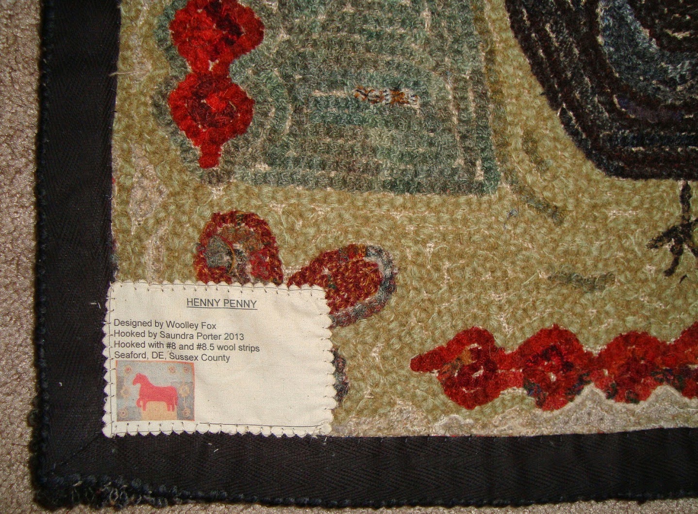 Saundra of Woodland Junction Making Rug Labels