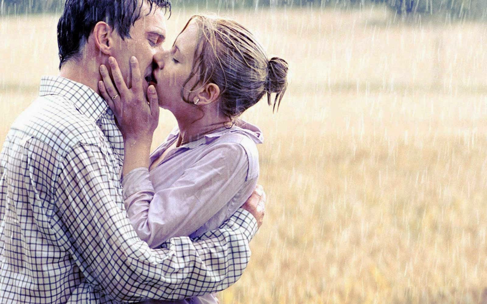 Romantic Love Couple Kissing in the Rain