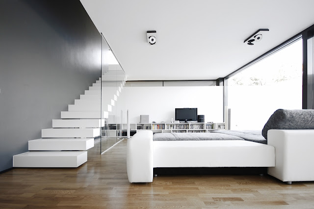 Modern minimal living room in the Black On White House by Parasite Studio 
