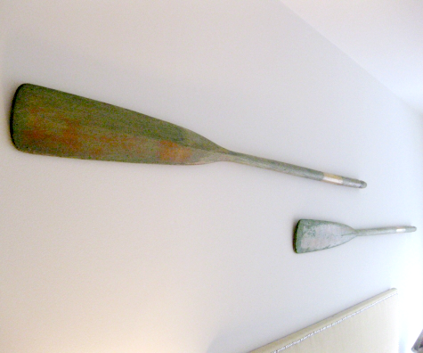 oars hanging on wall