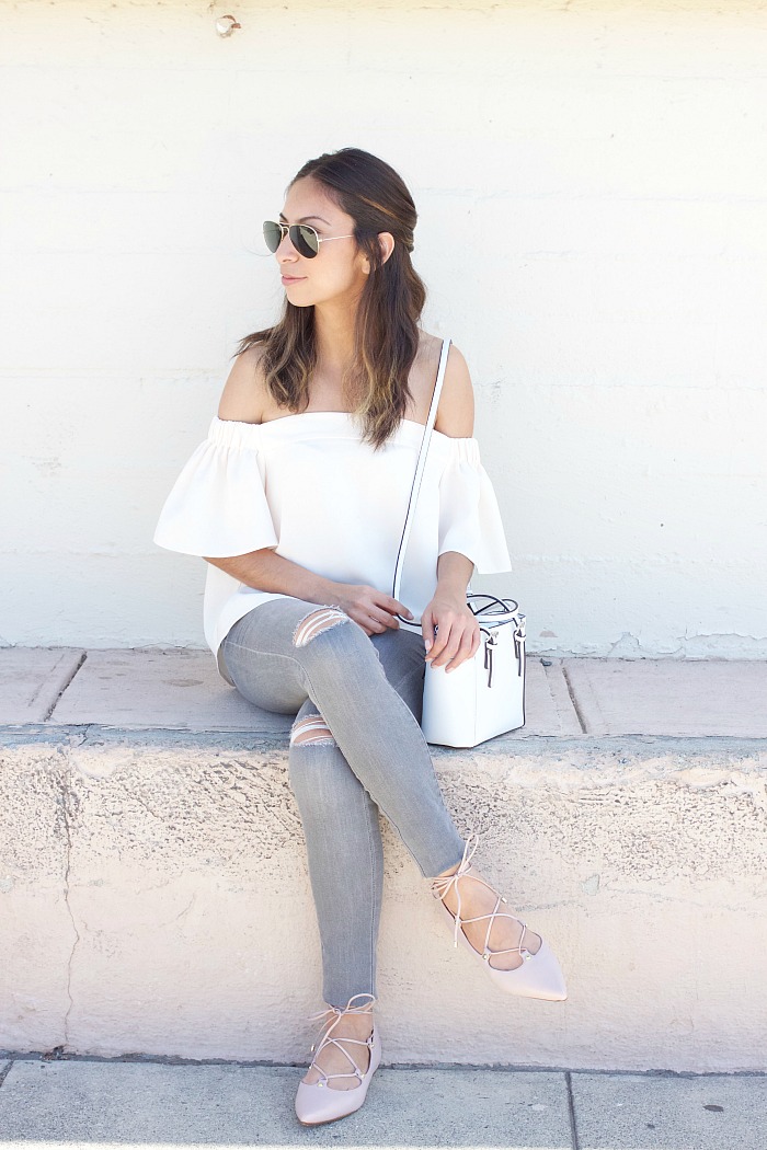 off the shoulder top, grey ripped jeans, blush flats