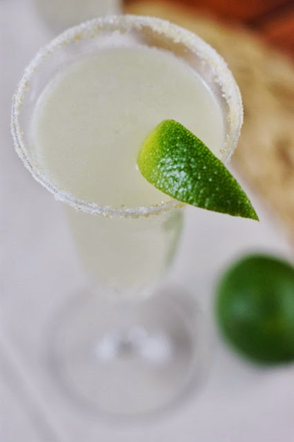 Champagne Margaritas Garnished with Lime image
