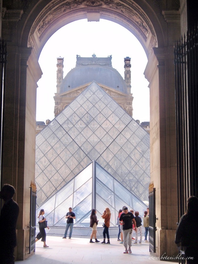 Glass pyramids with classic French Renaissance Louvre