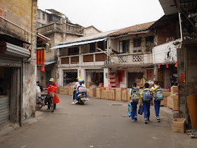 school children walking on Baisha Road in Jiangmen