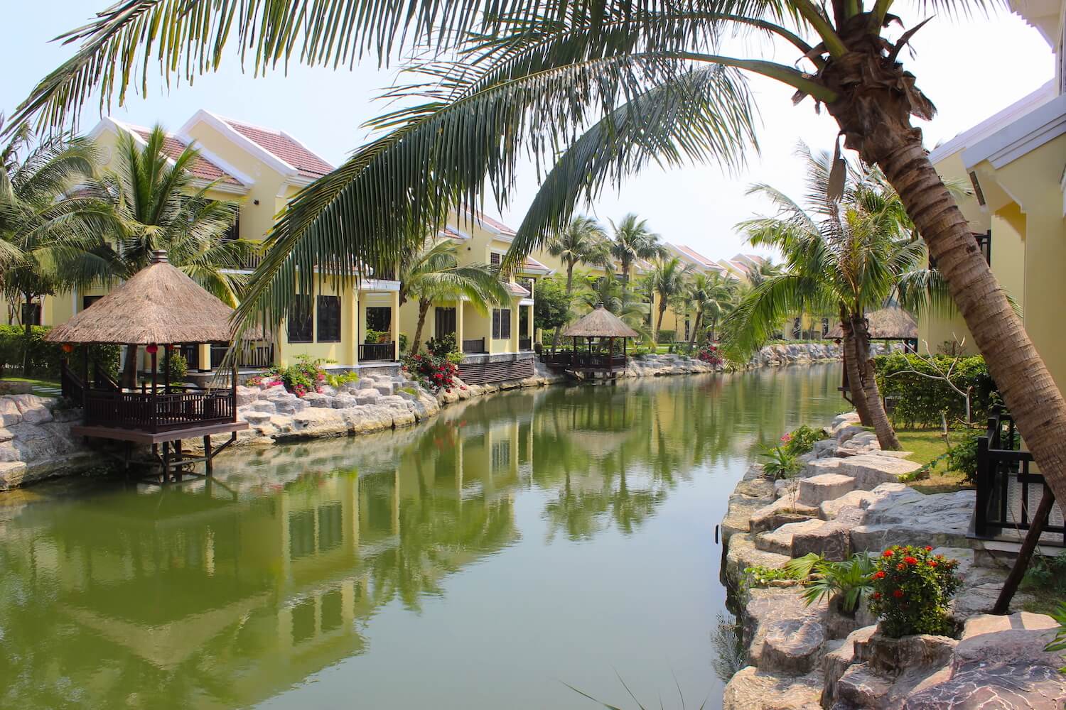 koi resort and spa lake and palm trees