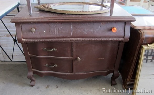 Shabby white distressed dresser by Petticoat Junktion, featured on I Love That Junk. The before...