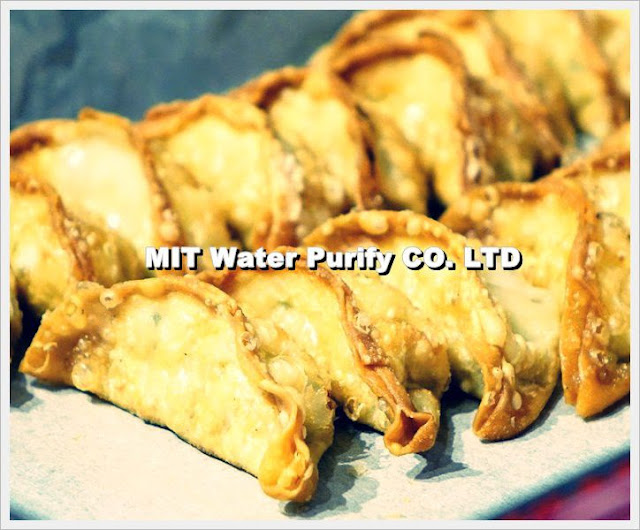 Chinese people fire the Traditional Chinese dumplings become the golden appearance. It looks like The Chinese traditional Golden Ingots by MIT Water Purify Professional Team Company Limited