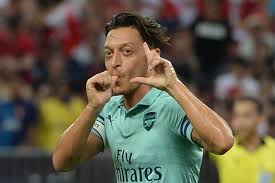 Ozil fires Arsenal to big win over PSG