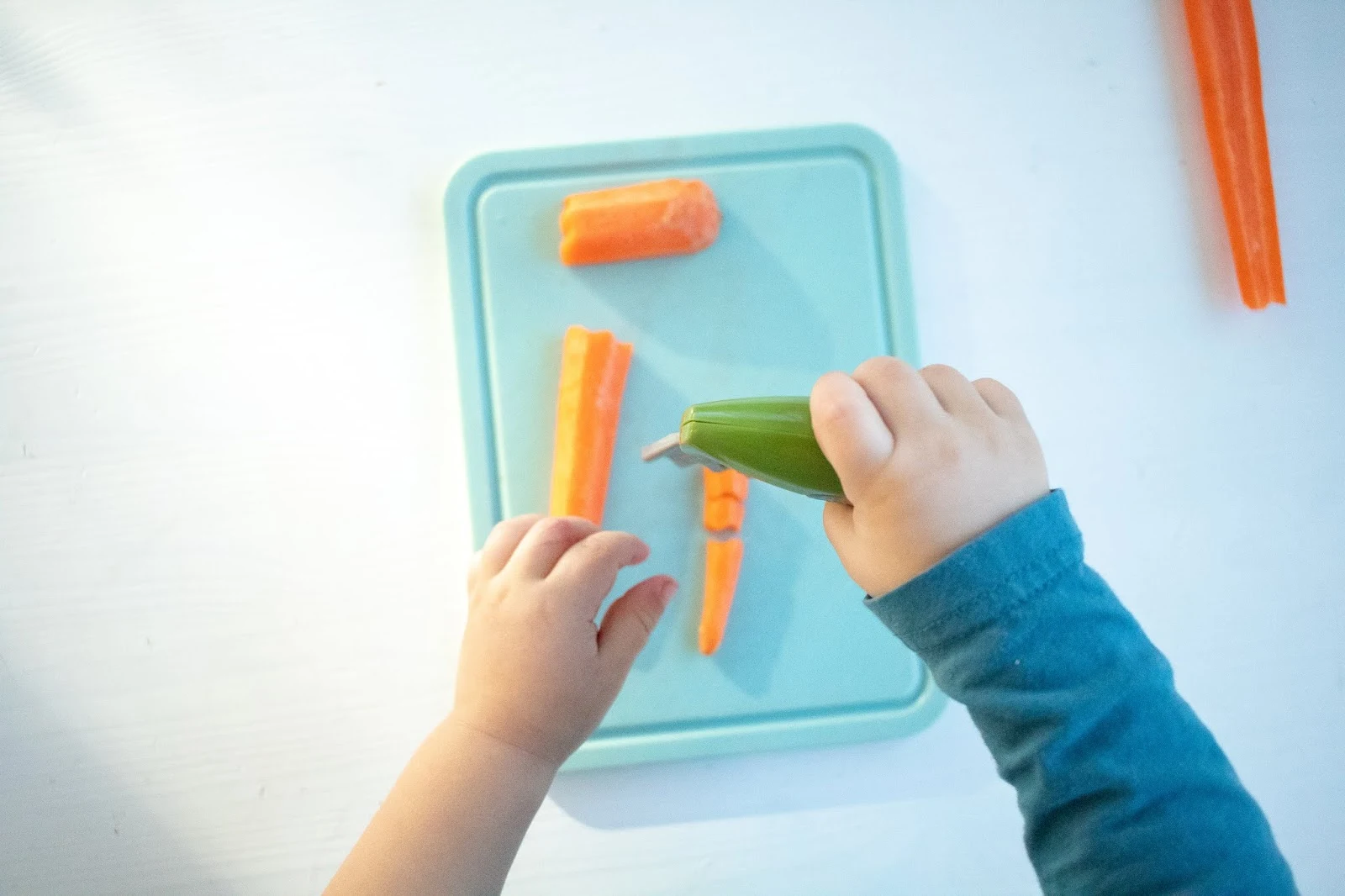 Here are some tips and tricks for introducing a wavy chopper knife to your toddler. This easy Montessori practical life tool can help encourage independence in the kitchen.