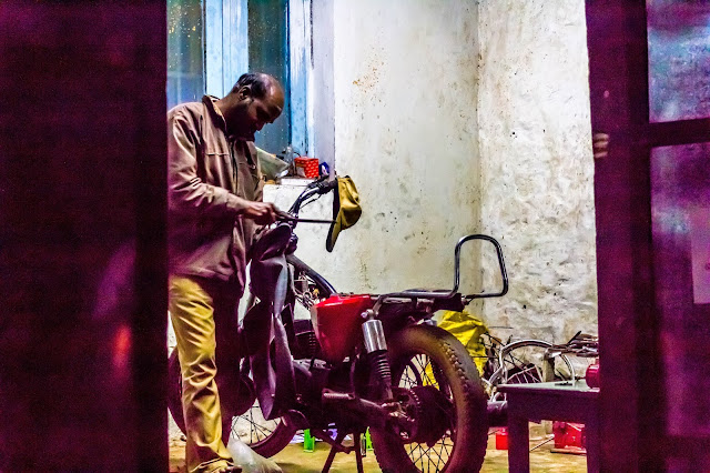 Mechanic fixing a tyre puncture on the way to Valparai