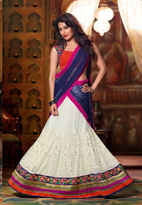 Bollywood Superstar And Indian Model Chitrangada Singh In Cream & Dark Blue Colored Designer Lehenga Choli.