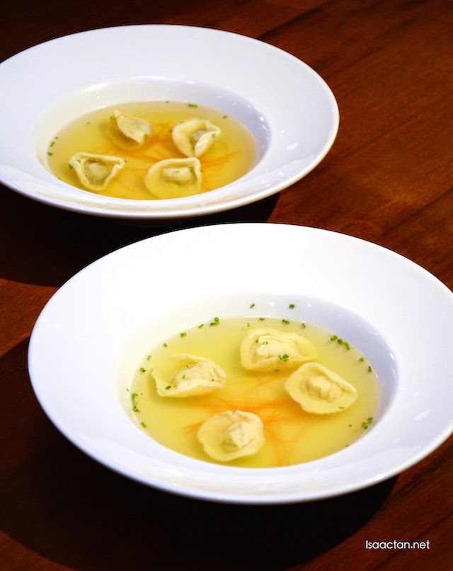 Clear Consomme with Chicken Tortellini and Tomato Consomme with Mixed Vegetables Tortellini