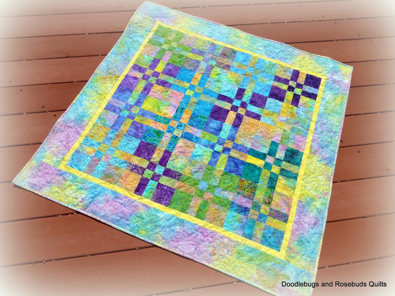 doodlebugs-and-rosebuds-quilts-disappearing-four-patch-baby-quilt