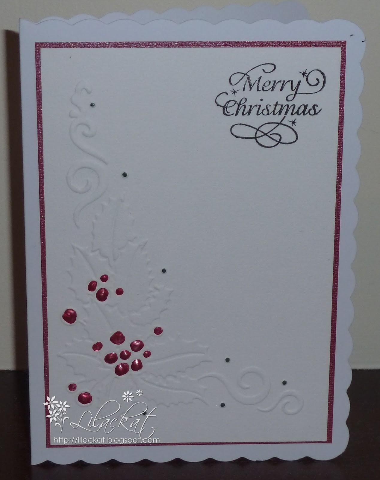 Lilackat Anyone for an embossed Christmas card?