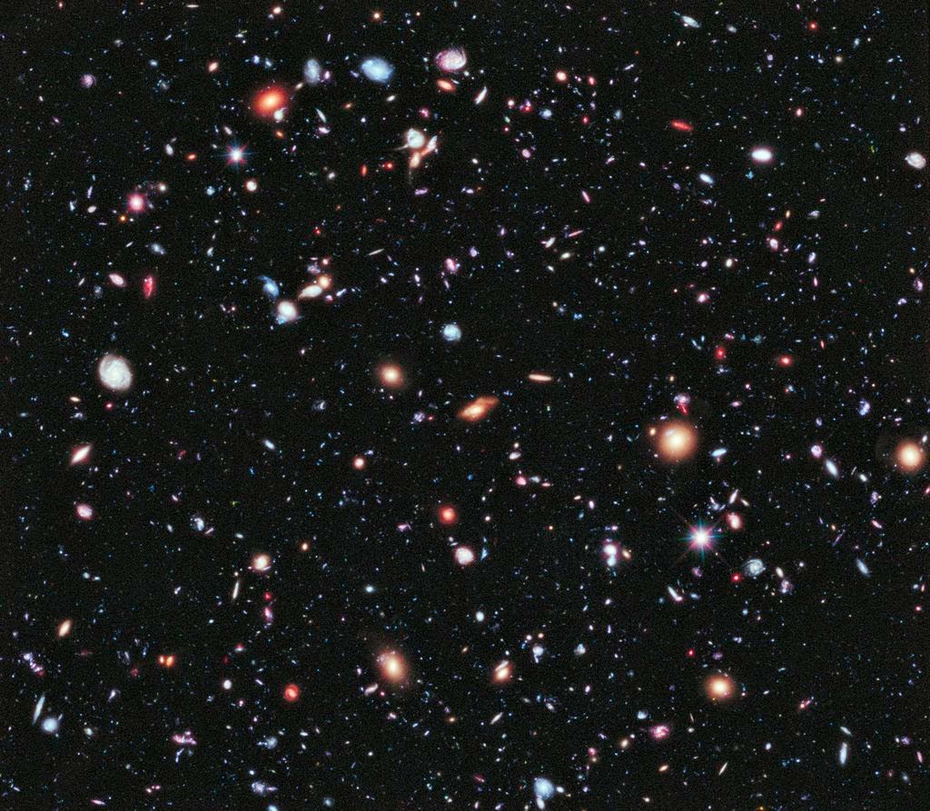 100s of galaxies seen through the Hubble Deep Field (HDF), as they were 10 billion years ago.