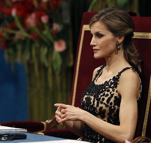 King Felipe, Queen Letizia and Queen Sofia attended ceremony of the Princess of Asturias Award 2016 at Campoamor Theater in Ovedio. Letizia wore diamond earrings, Magrit sandals, Felipe Varela dress