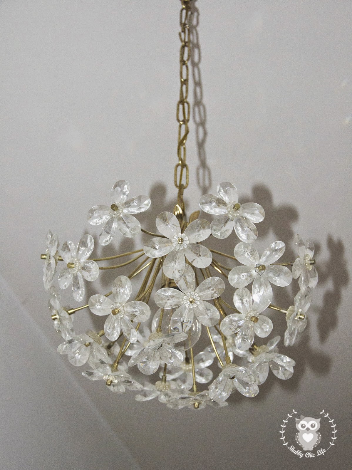 Brocante, antichità lampadario fiori cristallo
