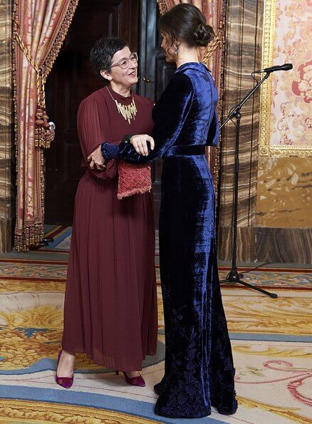 Queen Letizia wore a blue velvet gown by Spanish fashion house Felipe Varela, which she prefers to wear at these kind of events. aquamarine earrings