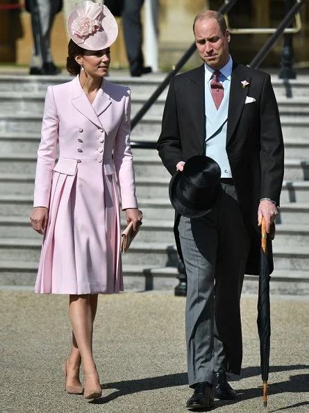 Kate Middleton wore a bespoke soft pink coatdress by Alexander McQueen. Loeffler Randall clutch. Countess of Wessex