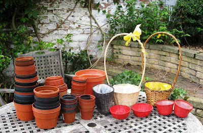 Collection of plant pots on the garden table