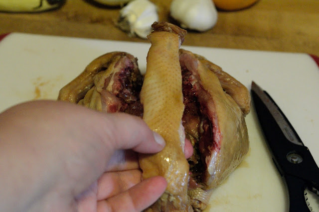 A Cornish hen, butterflied open, with the backbone removed.