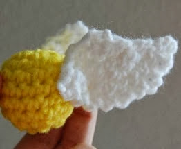 http://www.innerchildcrochet.com/patterns/files/the_golden_snitch.pdf