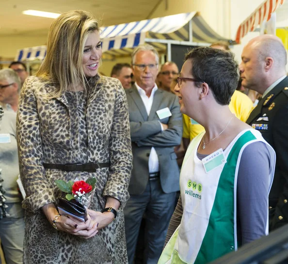 The Queen got to meet with various employees who work with the organization, as well as some of the people who benefit from the organization.