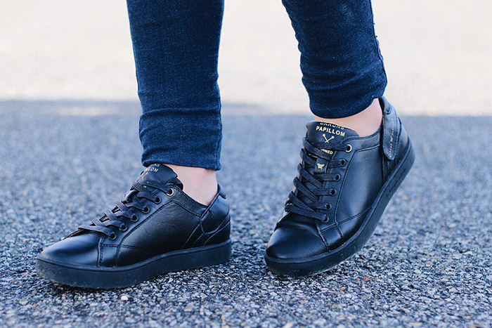 black leather sneakers