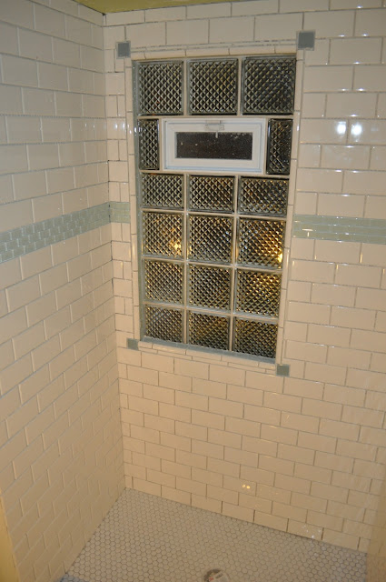 bathroom, reno, subway tile, sea glass tile, glass tile, white grout, grout, glass block window, 