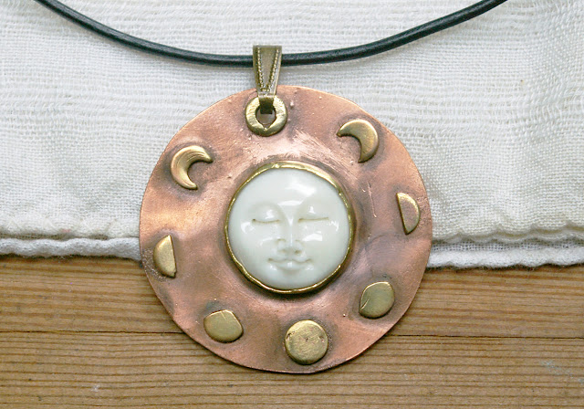 https://www.etsy.com/ca/listing/609432424/moon-phase-pendant-celestial-jewelry