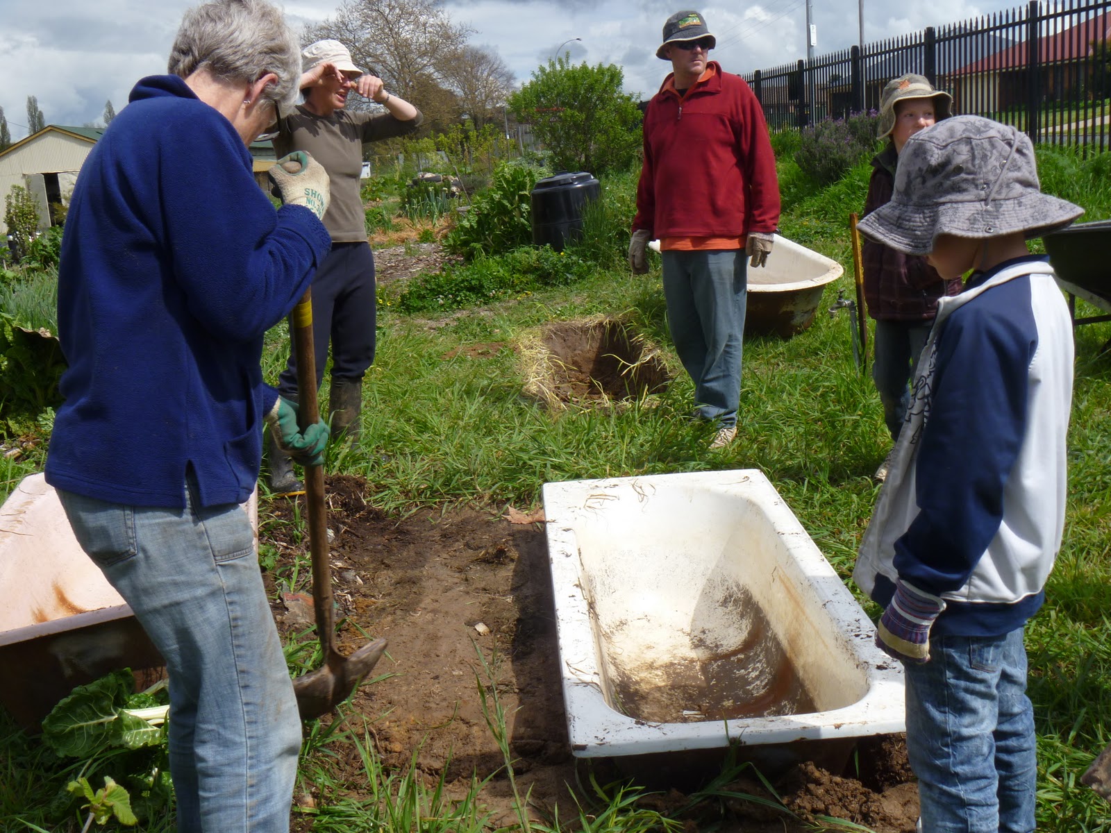toward sustainability with three kids...... Using old bath tubs to
