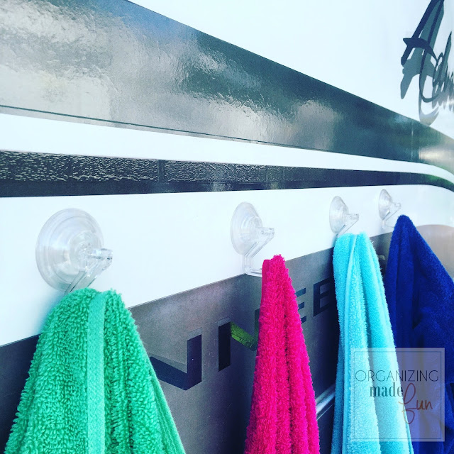 Use suction cup hooks to hang towels on the side of the RV :: OrganzingMadeFun.com