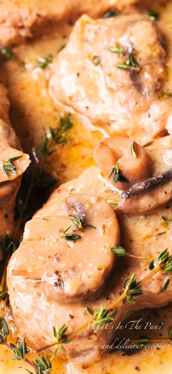 This is the BEST Instant Pot Pork Chops recipe: moist, fork-tender and flavorful pork chops smothered in creamy wine herb sauce!