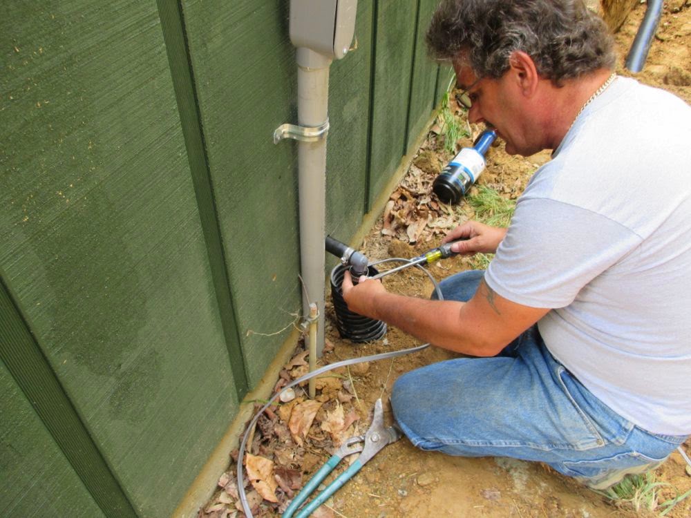 Mike and Lisa's World Getting The Septic Tank In And Hooking Up The Water