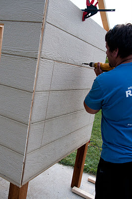 drilling wall of chicken coop