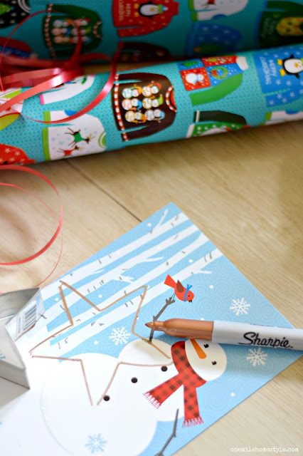 DIY your own holiday gift tags from old Christmas cards.