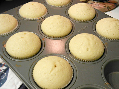 cooked cupcakes in a muffin pan 