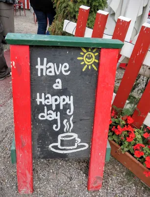 Have a Happy Day sign outside Regatta in Helsinki, Finland