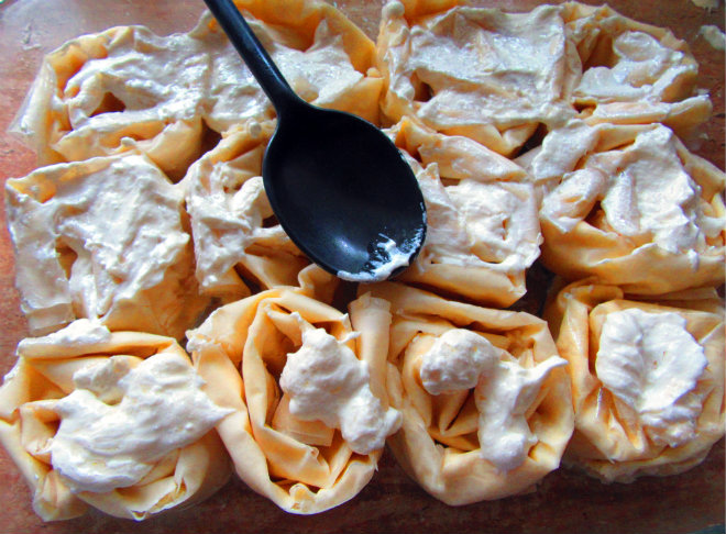 Savory filo pie with cheese by Laka kuharica: smear the top of each spiral with this mixture