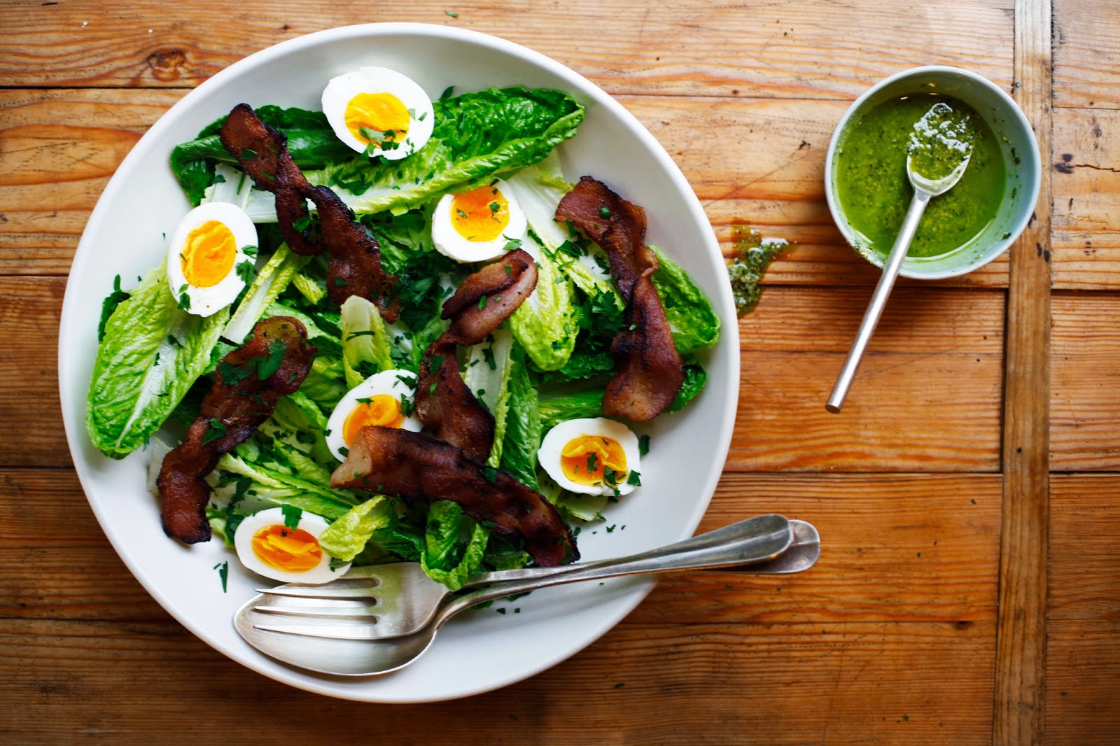 https://food52.com/blog/9863-romaine-salad-with-bacon-5-minute-eggs-and-pesto-dressing