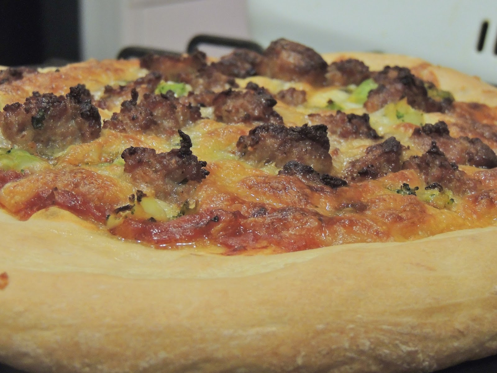 Gas Stove Girl Sausage and Broccoli Pizza