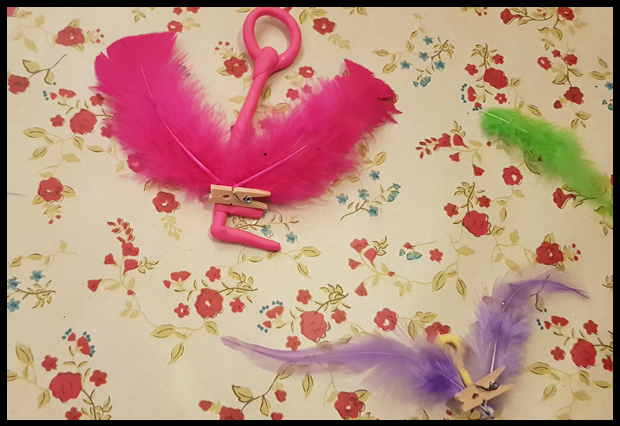 Keep feathers in place just long enough for the glue to dry