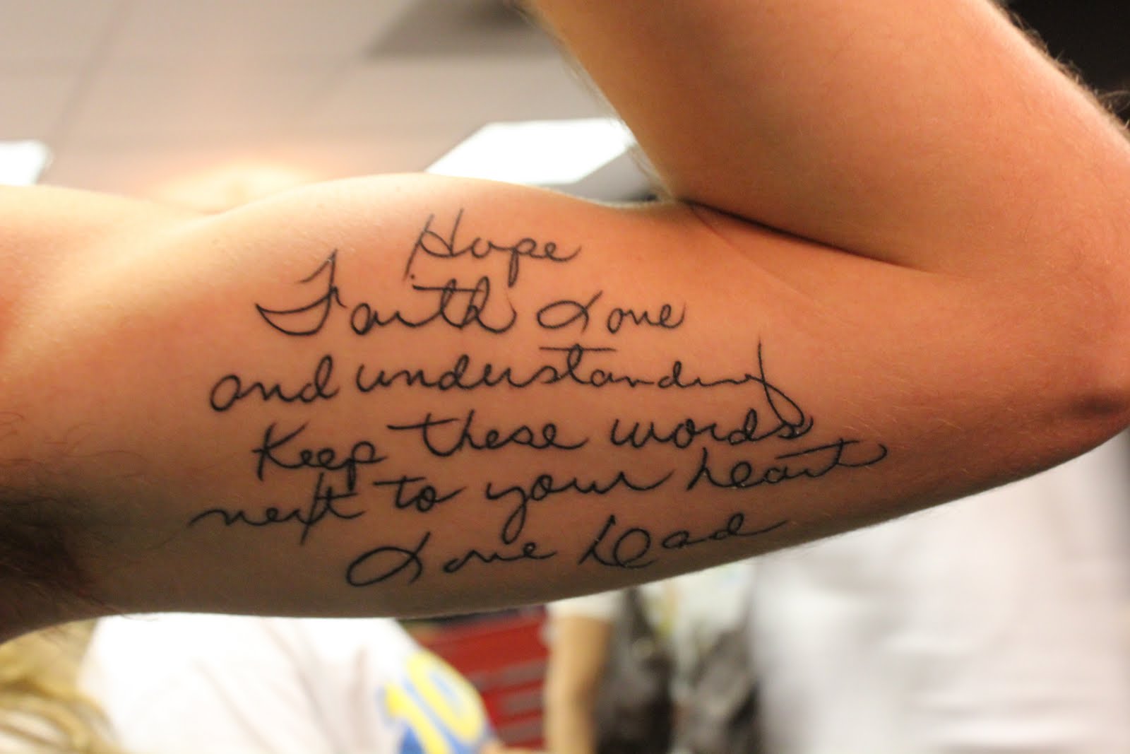 The arm of Intern Adam part of the WRVW morning show here in Nashville The quote is from his father and is done in his dad s handwriting too