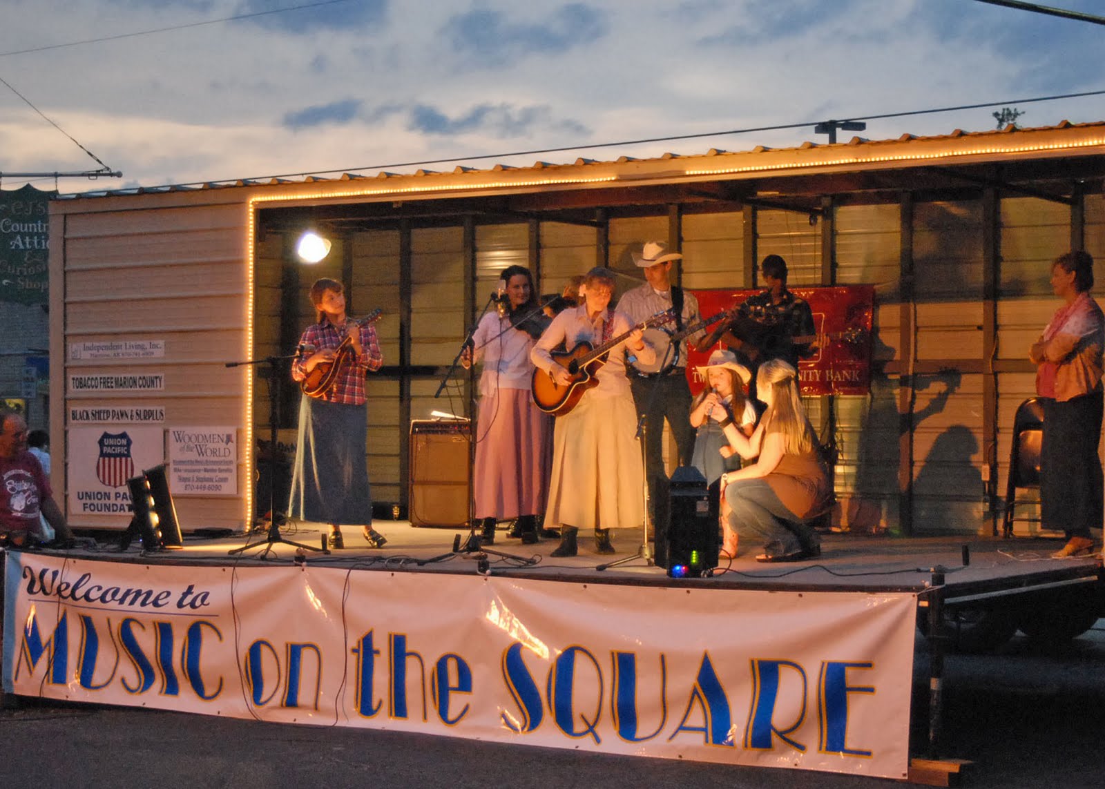 Waiting in the shade sitting on a brick Music on the Square