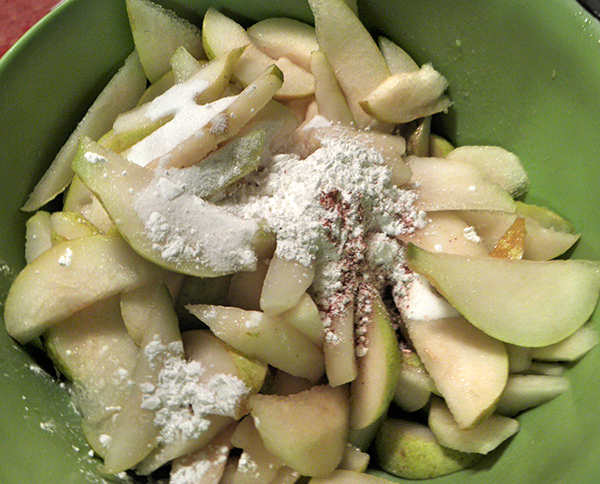 Sliced Pears Sprinkled with Sugar, Cornstarch, Nutmeg, and Vanilla