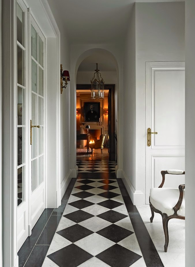 Checkered marble floor. Photo gallery of Greet  Lefèvre's Belgian home with interior design inspiration (photos by Claude Smekens and Belgian Pearls). Fall in love with enchanting gardens and traditional Belgian architecture and sophistication. #belgianinteriors #europeancountry #checkeredfloor