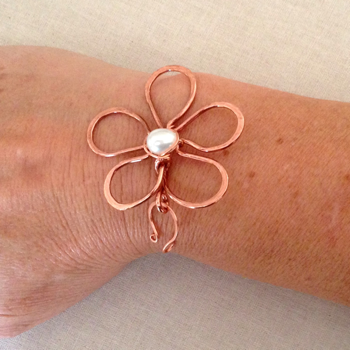 Handmade copper wire flower clasp with pearl center by Lisa Yang Jewelry
