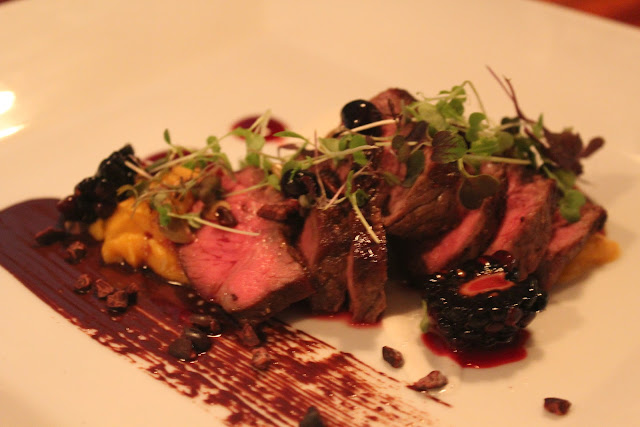 Sliced sirloin with berries at Cava, Portsmouth, N.H.