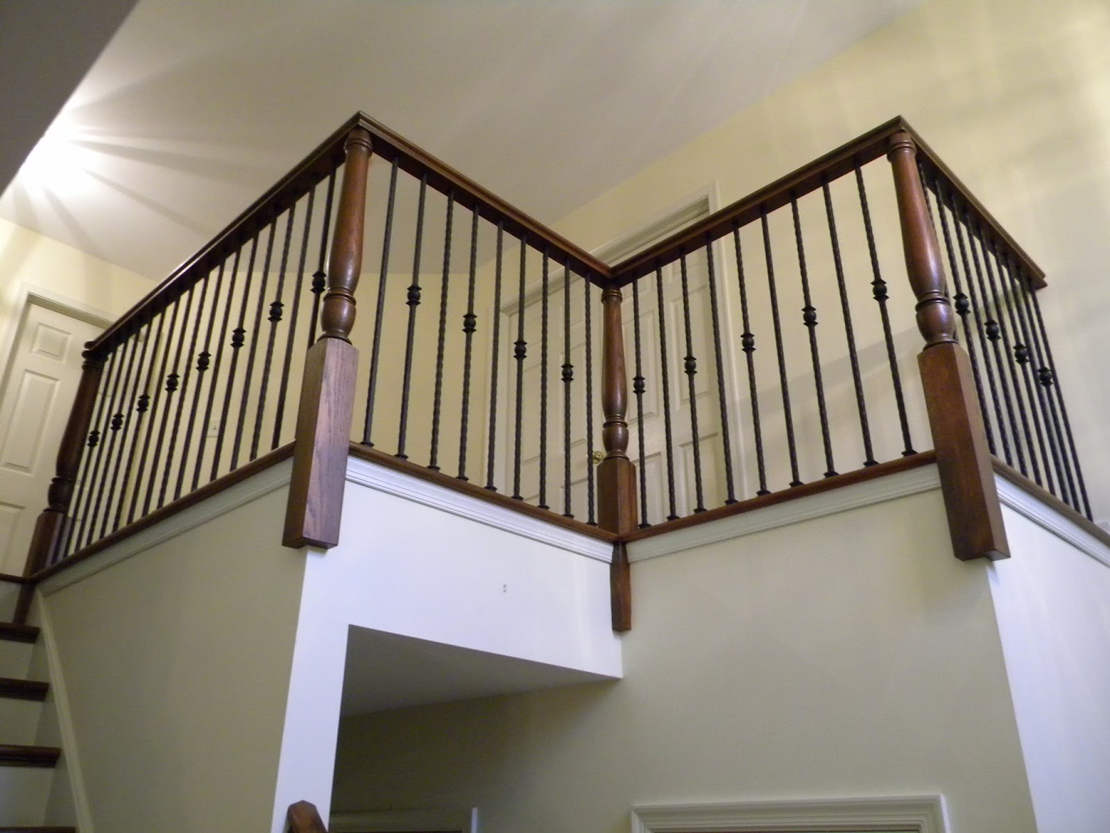 Wood Stairs and Rails and Iron Balusters Tuscan Square Hammered Iron